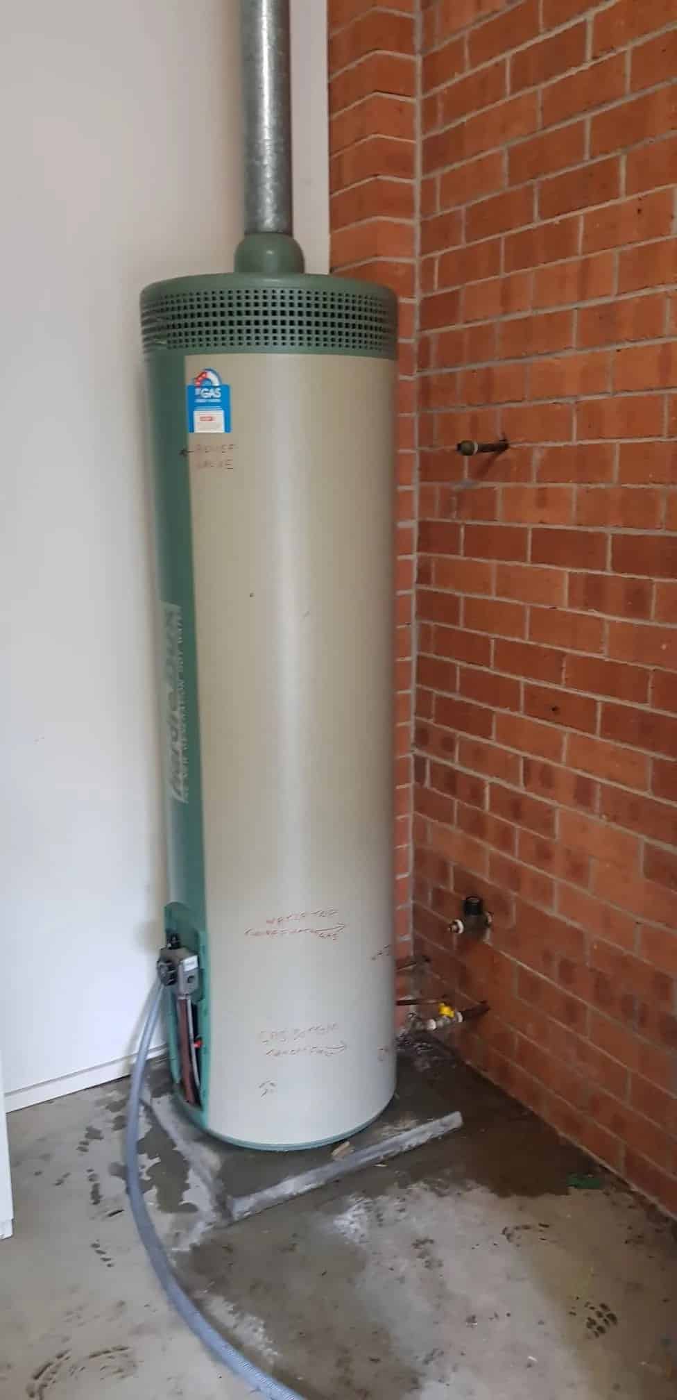 old hot water tank in room